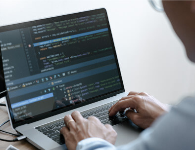Person typing on laptop